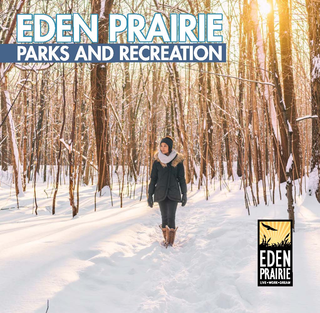 Parks and Recreation Winter Program Guide Cover - Woman Walking in the woods