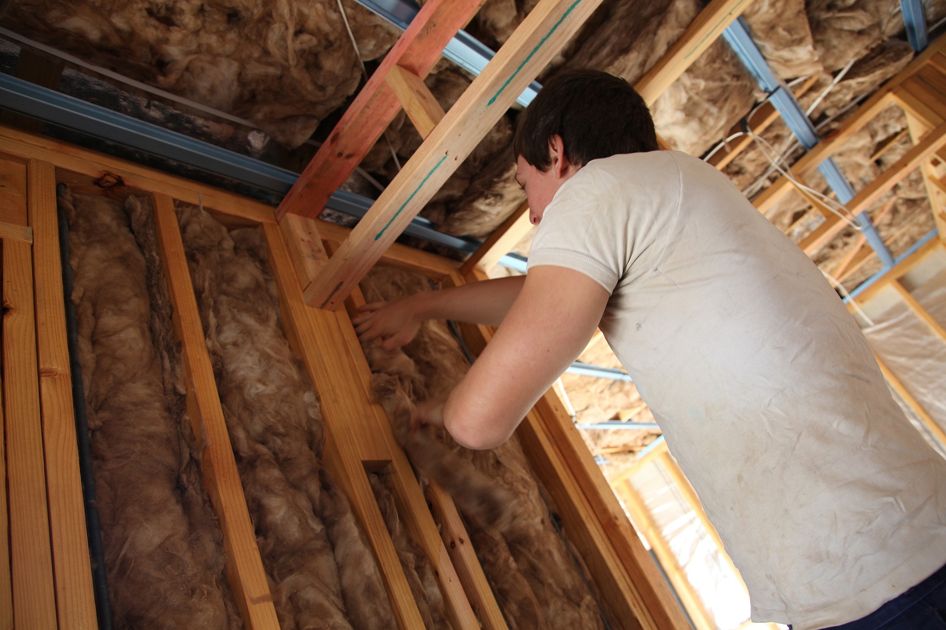 Person working on interior of house