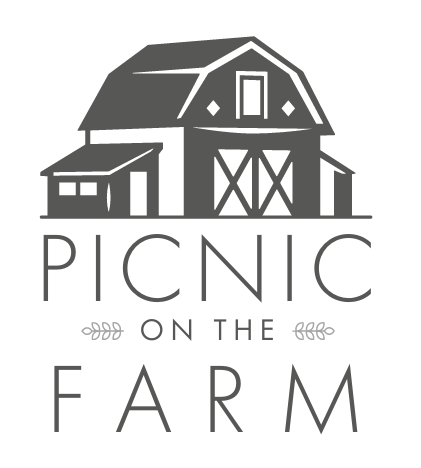 Picnic on the Farm logo featuring a barn